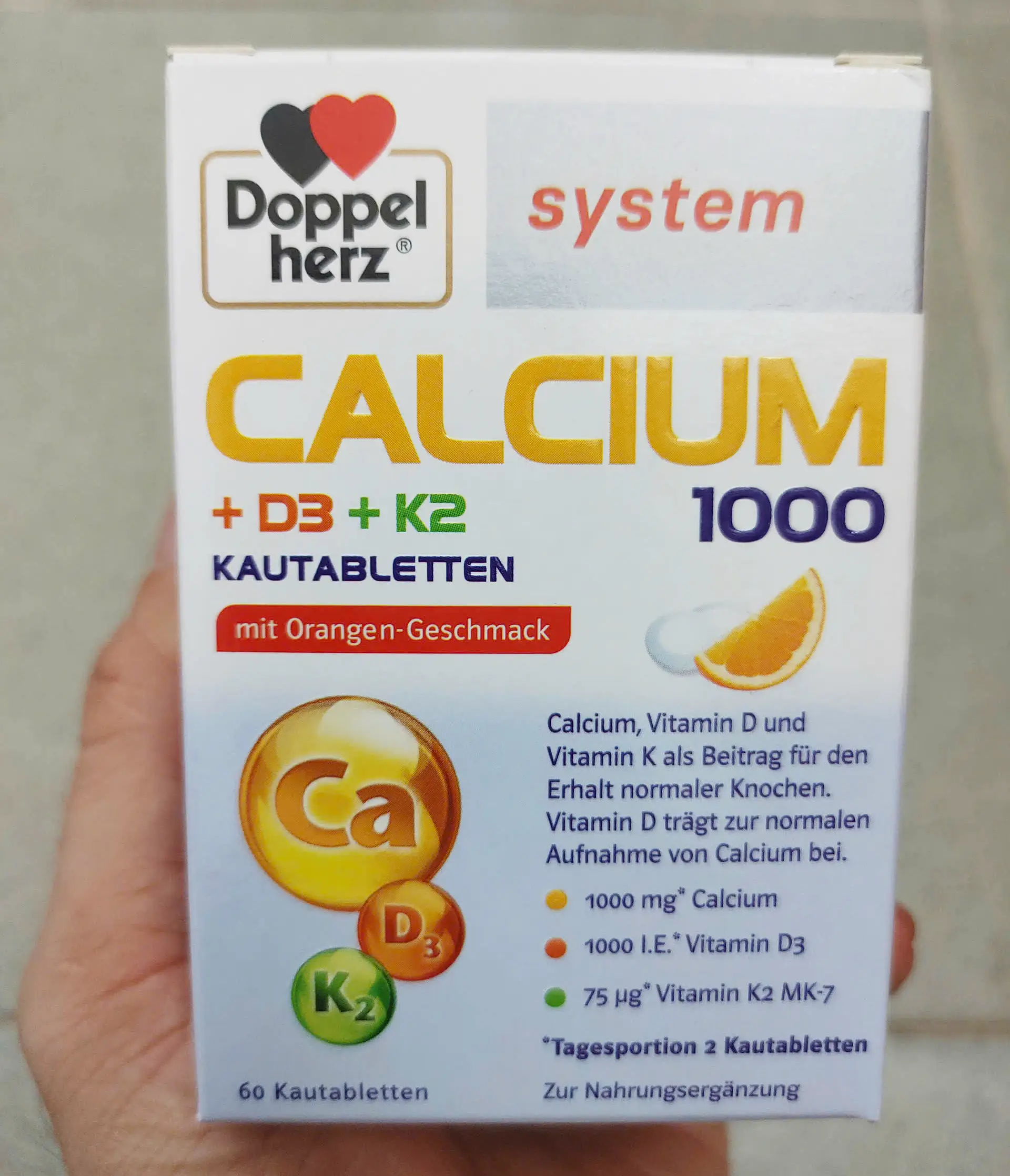 Viên nhai Doppelherz Calcium 1000 + D3 + K2 60 viên của Đức Viên Nhai Doppelherz Calcium 1000 D3 K2 Vị Cam, 60 Viên